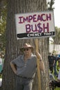 A protester holds a sign reading Impeach Bush at an anti-Iraq War protest march in Santa Barbara, California on March 17, 2007