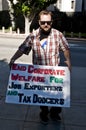 Protester Holds Up Sign at Occupy L.A.