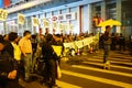 Protester holds a yellow umbrella to protest in Mong Kok, Hong K