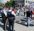 Protester hollers at Mounties