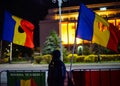 Protester and romanian flags, Bucharest, Romania Royalty Free Stock Photo