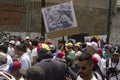 Protesters against Nicolas Maduro government showing photos of murdered hero medicine student Paul Moreno