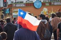 Protesters with Chilean flag at Puerto Montt city