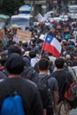 Protesters with Chilean and Mapuche flag at Puerto Montt city