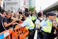 Protesters Demand Dissident Death Probe in H.K.