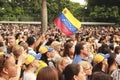 Protesters in Caracas Venezuela displaying a flag