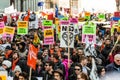 Protesters Holding all kind of Signs, Flags and Placards in the Streets. Royalty Free Stock Photo