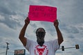 A protesters holds up a Hands Up Don't Shoot sign Royalty Free Stock Photo