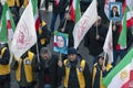 Protesters with Iranian flags and posters attend demonstration and protest against Moderate Rouhani executions in Iran Royalty Free Stock Photo