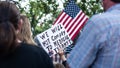 Anti-vaccine mandate protest sign held by child with american flag Royalty Free Stock Photo