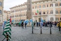 Protesters people gathered to strike with flags in front of the Italian government in Rome