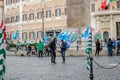 Protesters people gathered to strike with flags in front of the Italian government in Rome