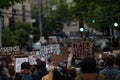 Protesters with signs during Seattle protest marching to Capitol Hill