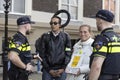 Protesters talking to police on Prinsjesdag in The Netherlands