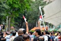 Protesters wave flags at May Day rally Singapore