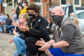 Protesters wear face coverings while kneeling at a Black Lives Matter protest in Richmond, North Yorkshire