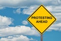 Protesting Ahead Warning Sign Royalty Free Stock Photo