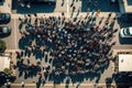 Protesting crowd at city street. Protesting people marching at city, aerial view. Social problems in society, struggle