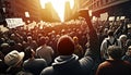 Protesting crowd people on city street with raised fist rear view, anti war national protest march Royalty Free Stock Photo