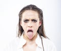 Protesting. Displease Disgust concept. Girl showing tongue in protest. Royalty Free Stock Photo