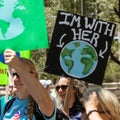 Protestor with Earth Sign at Climate March