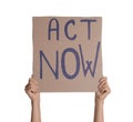 Protestor holding placard with text Act Now on white background, closeup. Climate strike