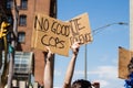 Protestor Holds Up Sign that Reads `No Good Cops` at Protest for George Floyd