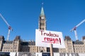 Protestor at Parliamant Hill in Ottawa calls for Justin Trudeau to resign