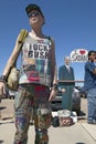 Protestor with a t-shirt that reads Bush at a George W. Bush protest rally in Tucson, AZ