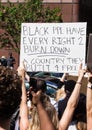 Protestor Holds Up Sign at a Protest of the Murder of George Floyd Royalty Free Stock Photo