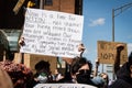 Protestors March and Hold Up Signs for Justice for George Floyd Royalty Free Stock Photo