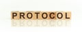 Protocol word made with building blocks on a light background