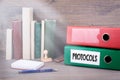 Protocols. Binder on desk in the office. Business backgroundr Royalty Free Stock Photo