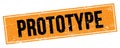 PROTOTYPE text on black orange grungy rectangle stamp
