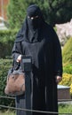 Protrait of Muslim veiled woman.