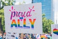 Proud ally. Pride month concept. Colorful homemade cardboard poster showing support for LGBTQAI community.