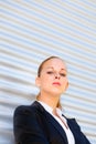 Proud business woman standing at office building Royalty Free Stock Photo