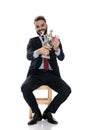 Proud businessman smiling and presenting trophy Royalty Free Stock Photo