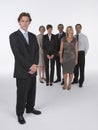 Proud Businessman With team Behind Royalty Free Stock Photo