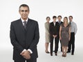 Proud Businessman With team Behind Royalty Free Stock Photo
