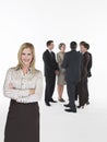 Proud Businesswoman With Group Behind Royalty Free Stock Photo