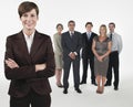 Proud Businesswoman With Team Behind Royalty Free Stock Photo