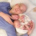 Proud daddy of newborn twins Royalty Free Stock Photo