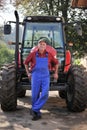 Farmer and his Red Tractor Royalty Free Stock Photo