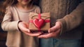 Proud father showcases handmade gifts from beloved children.AI Generated