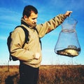 Proud fisherman with catch Royalty Free Stock Photo