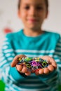 Proud kid holding rubber bands