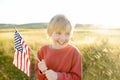 Proud little american boy holding his country flag Royalty Free Stock Photo