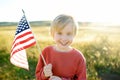 Proud little american boy holding his country flag Royalty Free Stock Photo