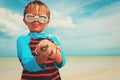 Proud little boy found seashells on beach Royalty Free Stock Photo